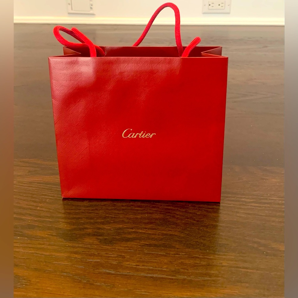 Cartier small red shopping bag. Chic room or closet accent